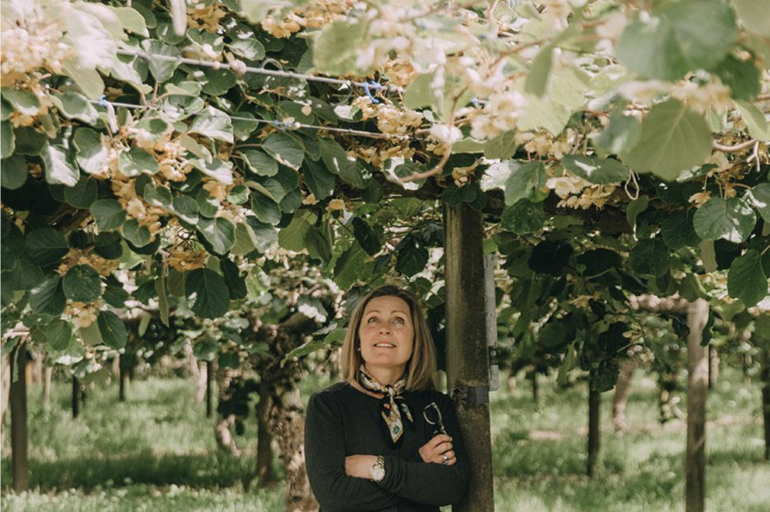 Amanda Owner of Nanric Road Under Kiwifruit Vines